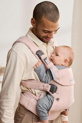 BabyBjörn Harmony ergonomic waist belt supports wearer with pressure relief.