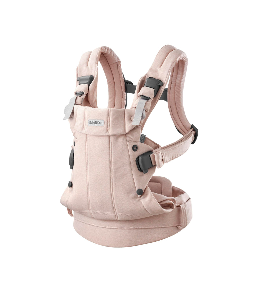 BabyBjörn Harmony light pink woven mélange closeup shows breathable mesh for baby comfort.