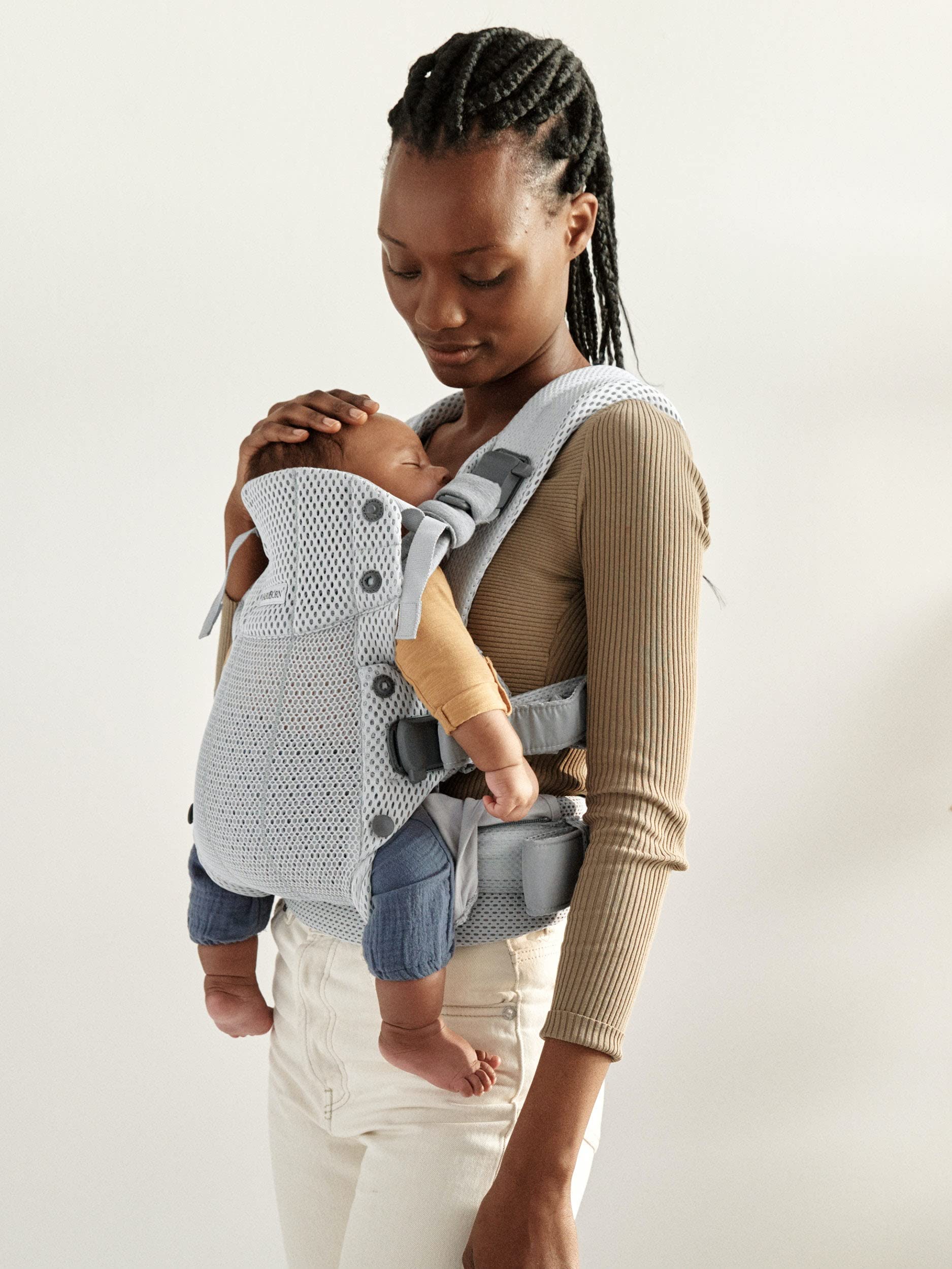 BabyBjörn Harmony padded shoulder straps shown for comfortable, secure baby carrying.