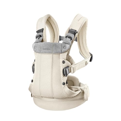 BabyBjörn Harmony worn by parent demonstrates ergonomic support and comfortable straps.