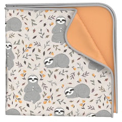 Babyboet Splat Mat under high chair close-up of four-layer waterproof design for spill protection.