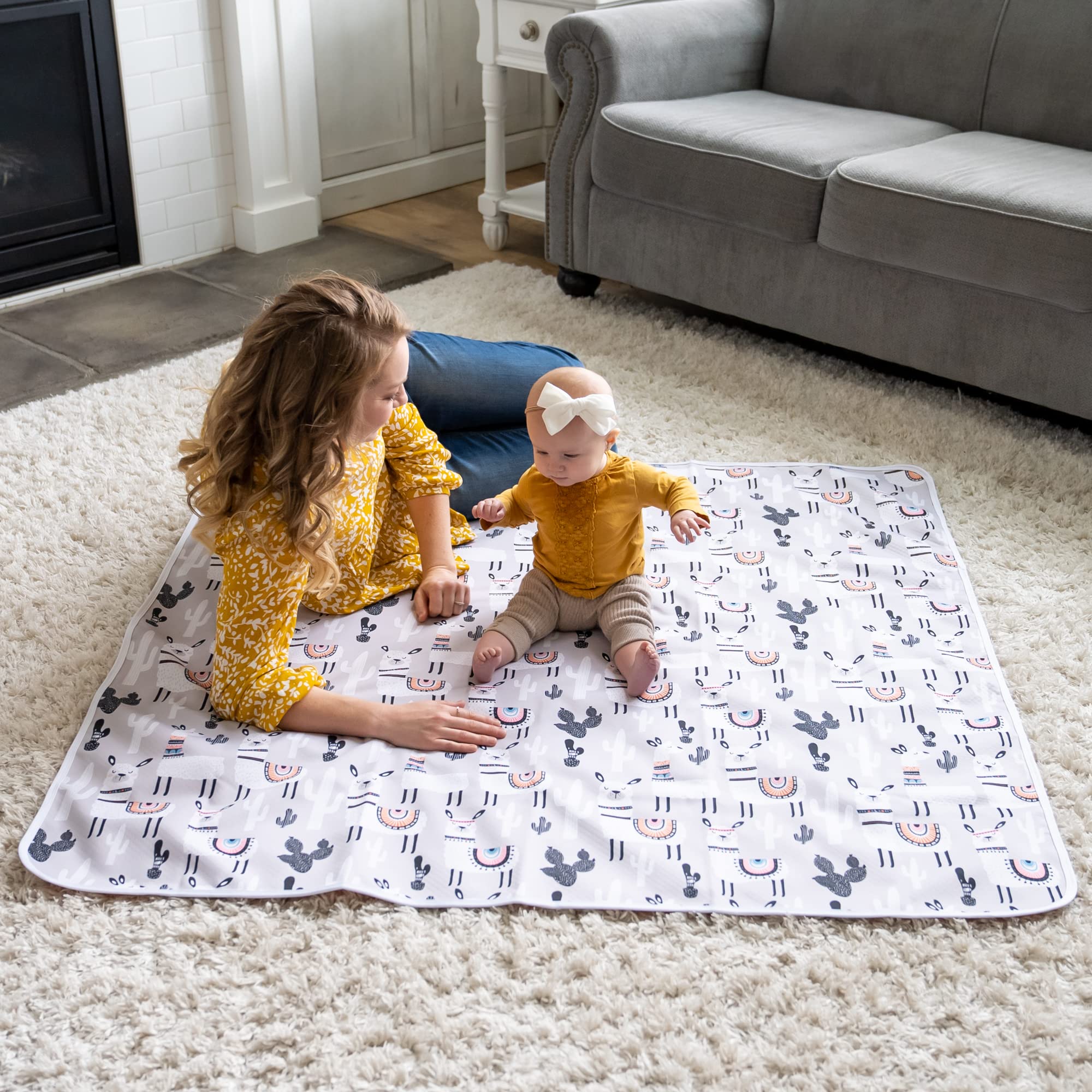 BABYBOET Splat Mat wildlife print closeup; gender-neutral design for versatile use