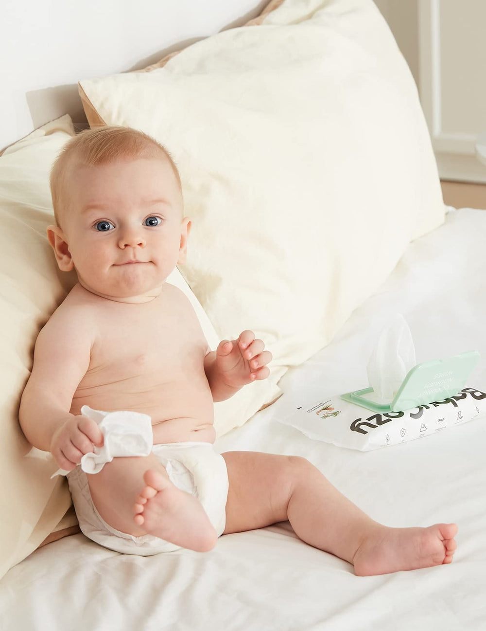Babycozy Sensitive Wipes one-handed use demonstrates easy diaper changes.