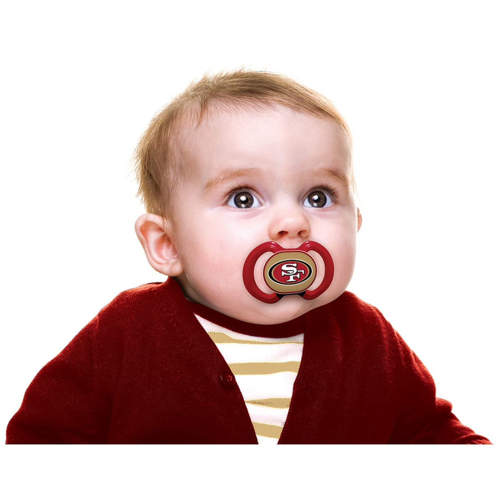 Baby Fanatic pacifier shield in team colors showing San Francisco 49ers branding.