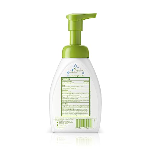 BabyGanics hand sanitizer foaming application shows gentle cleansing on skin.