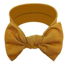 BABYGIZ baby girl headband bow goldenrod closeup showing soft cotton comfort.