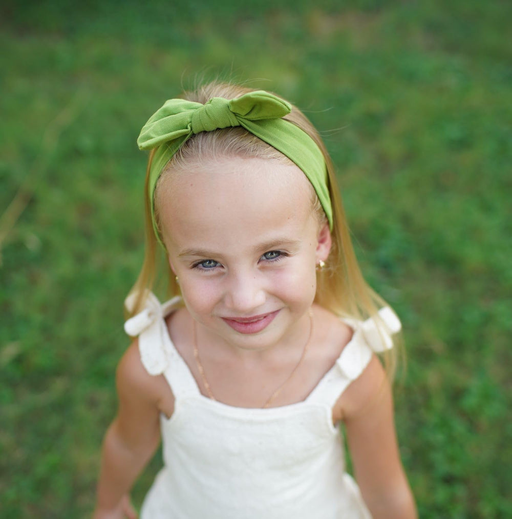 BABYGIZ headband used as photo prop during shoots.