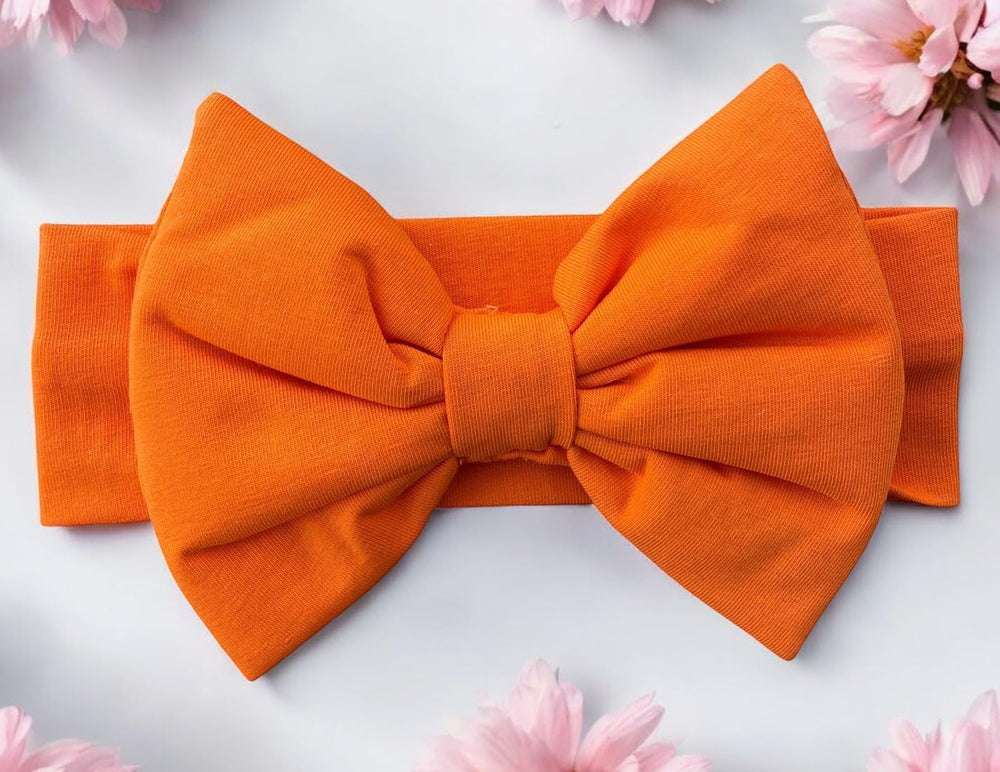 BABYGIZ headband worn during mornings and naps for stay-in-place style