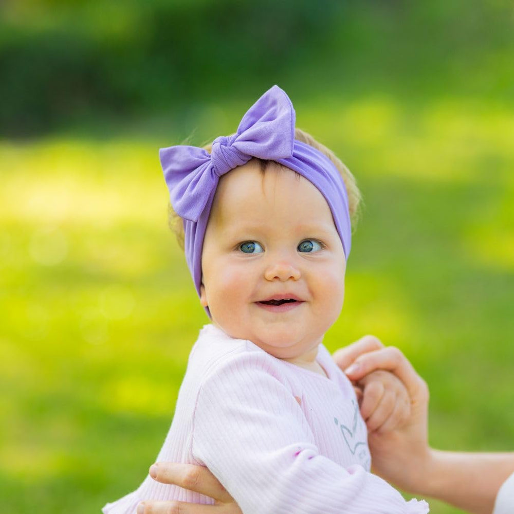 Babygiz stretchy cotton headband keeps baby comfortable and secure.