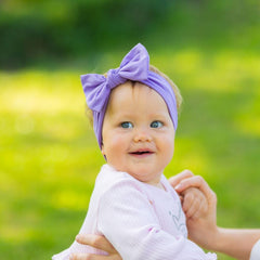 Babygiz stretchy cotton headband keeps baby comfortable and secure.