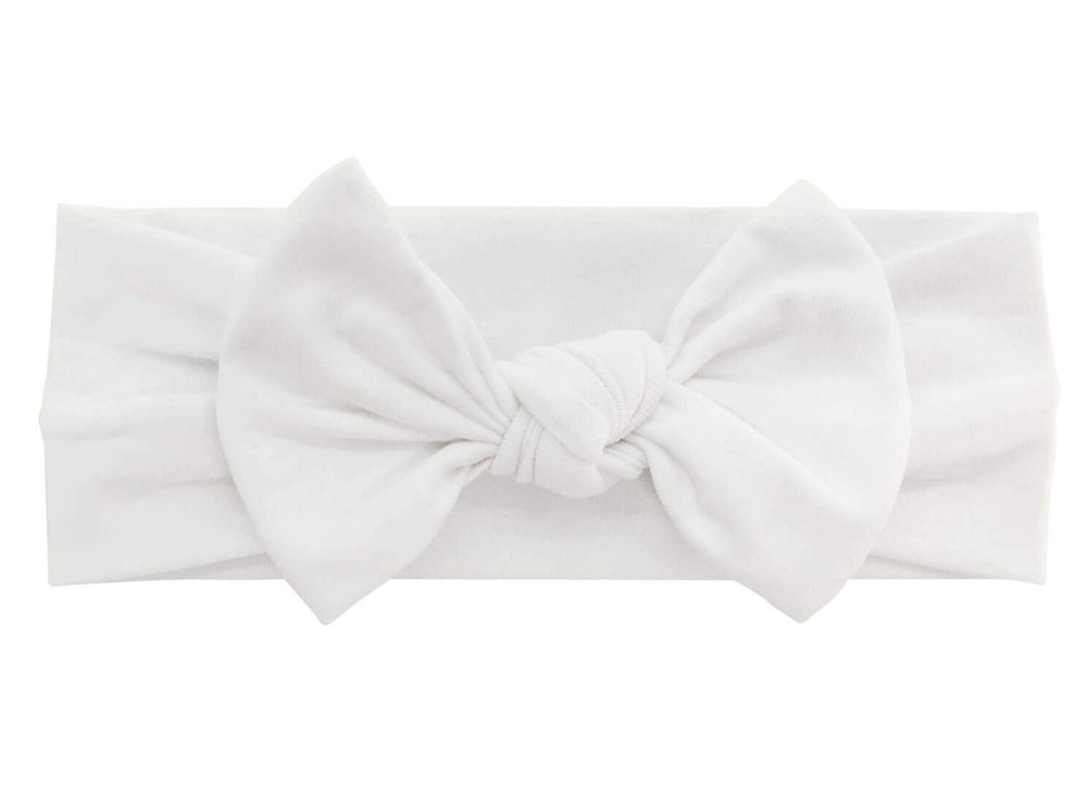 BABYGIZ white bow headband in photo shoot setup for keepsake