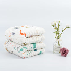 Babygoal hooded towel draped over baby for cozy warmth and full coverage