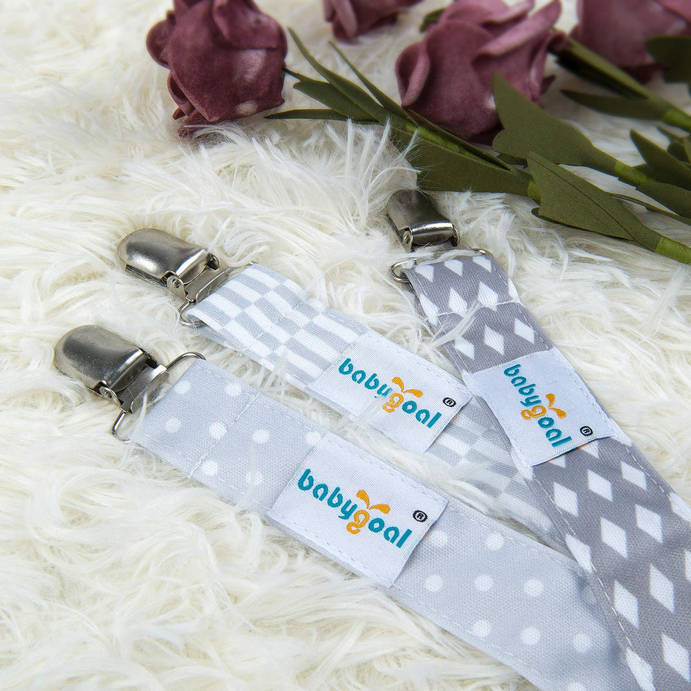 babygoal pacifier clips securing on baby clothing