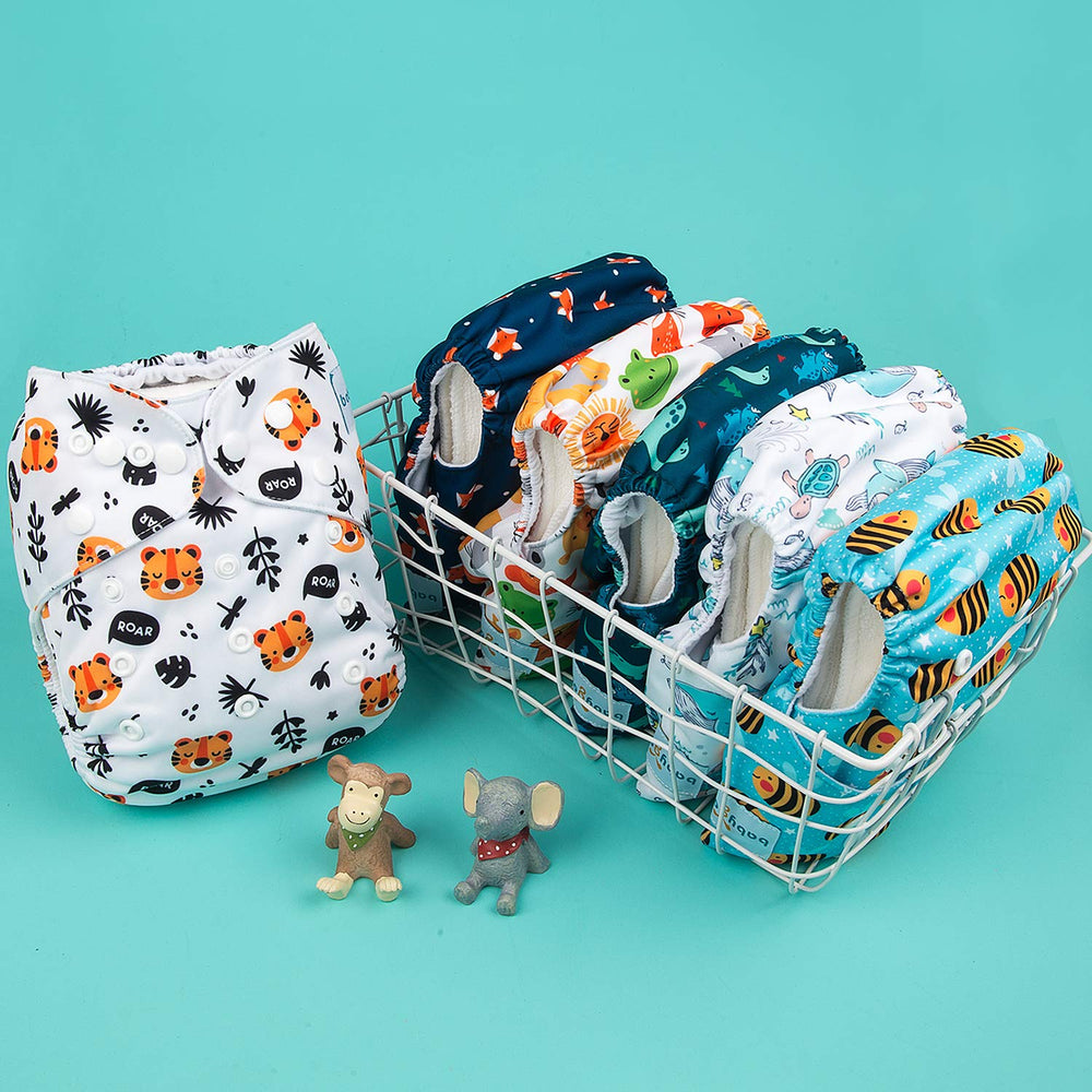 Contents image highlights 6 diapers and 10 inserts for complete coverage.