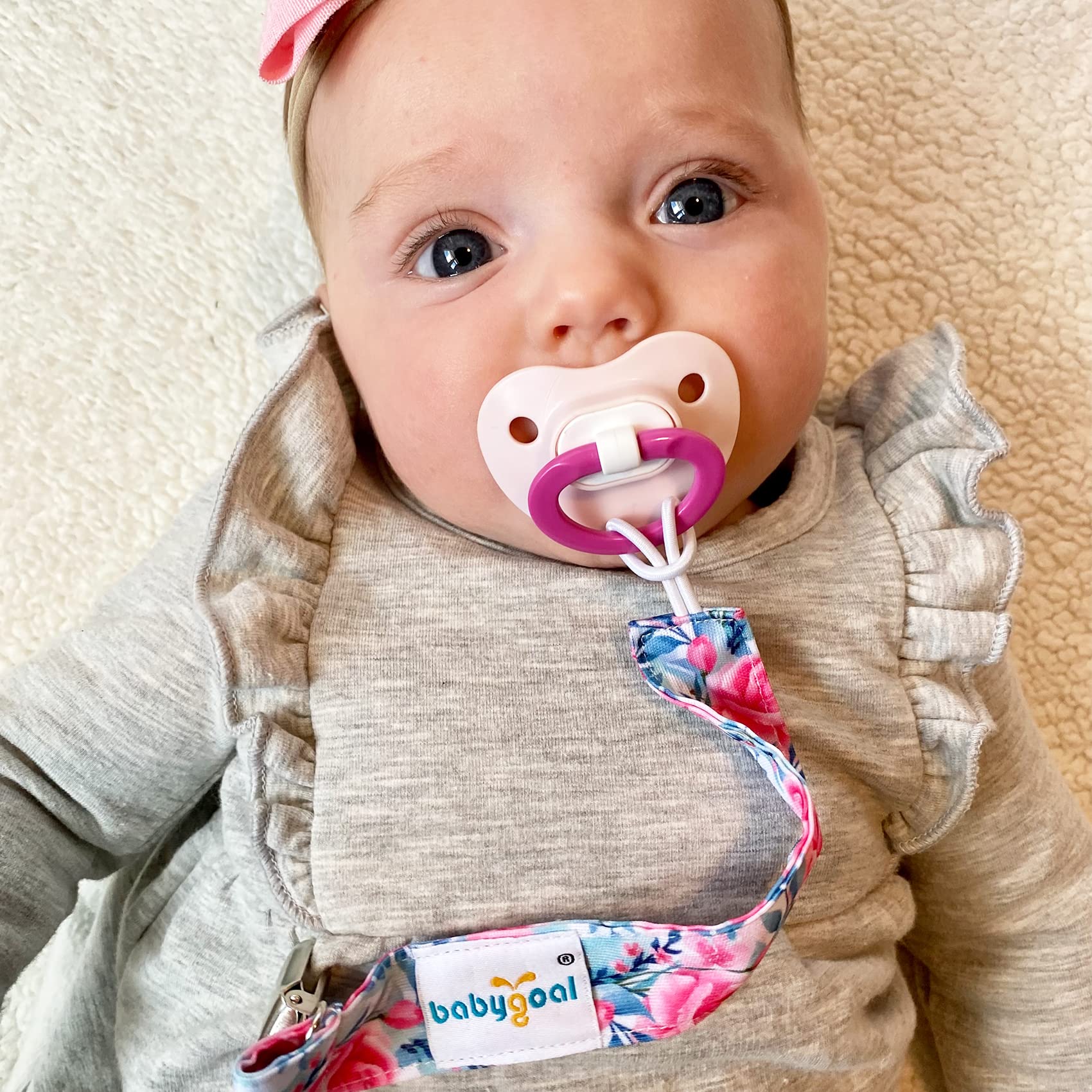 babygoal solid-color pacifier clip simple durable design fits most pacifiers.