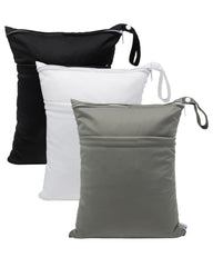 Babygoal wet dry bag 3pack flat layout keeps travel kit organized.