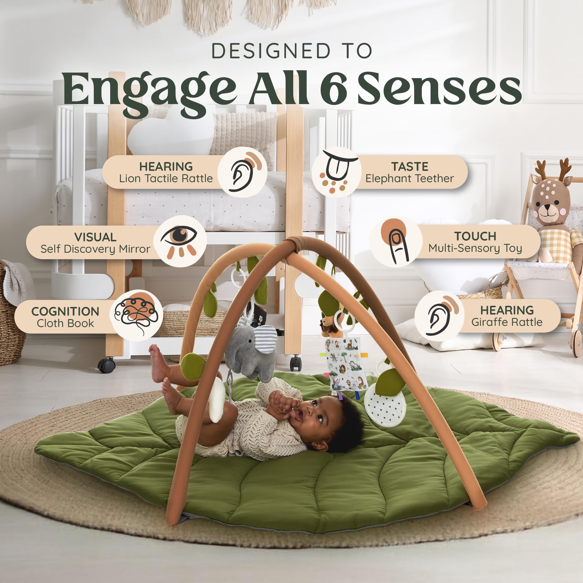 Babylicious oversized leaf-design play gym shown in nursery