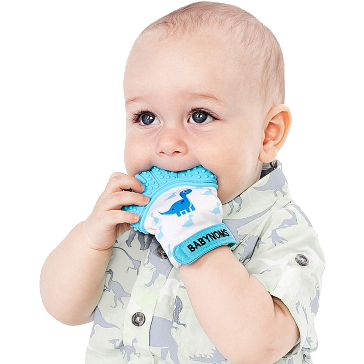 BabyNoms teething mitten with dino blue silicone soothes gums during playtime