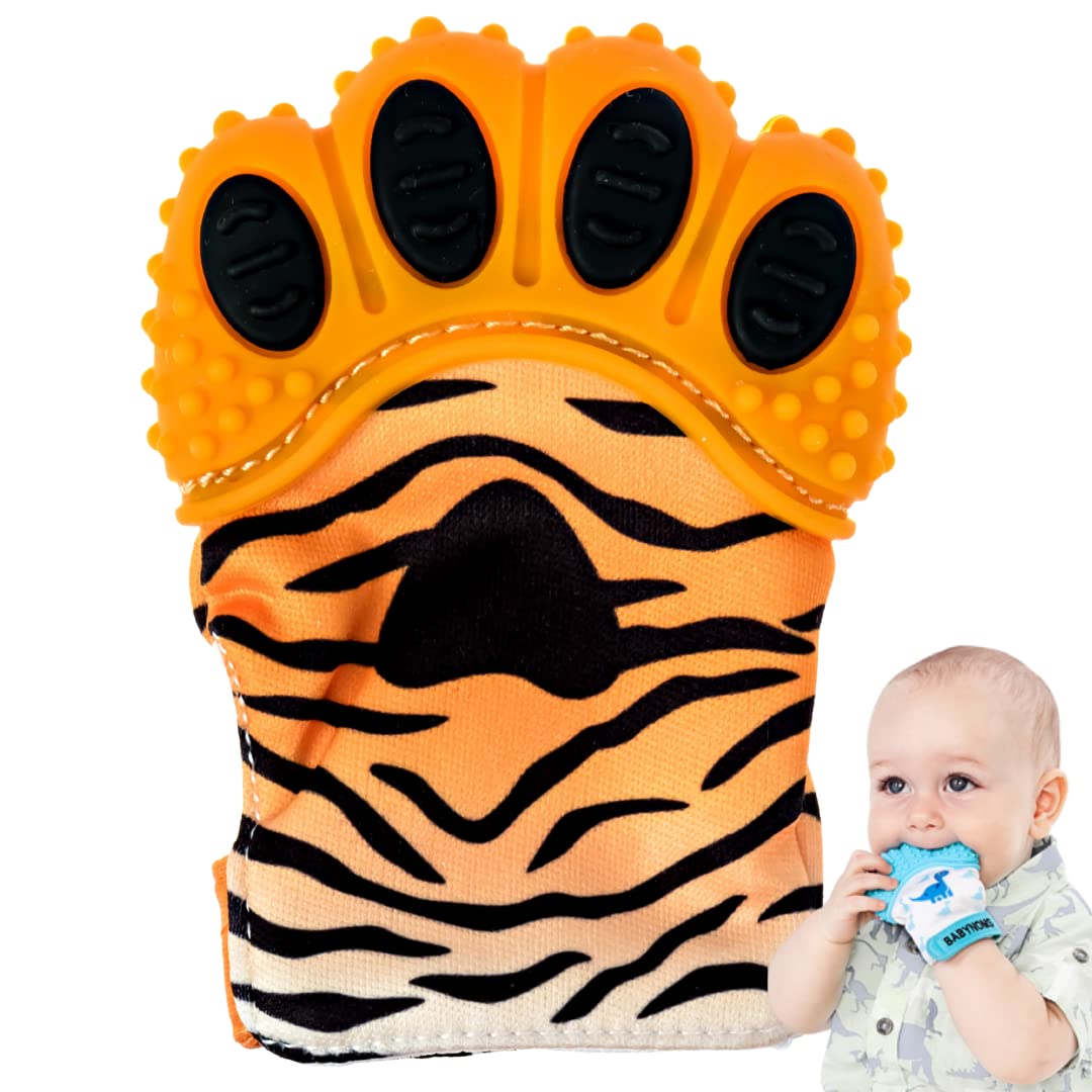 BabyNoms teething mitten on baby's hand with orange tiger paw for soothing relief