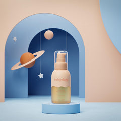 Babyology newborn massage scene promoting a soothing bedtime routine.