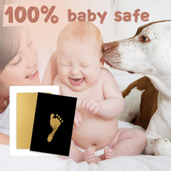 BabyQunt clean-touch ink pad shows no ink on baby's hands for clean, worry-free prints
