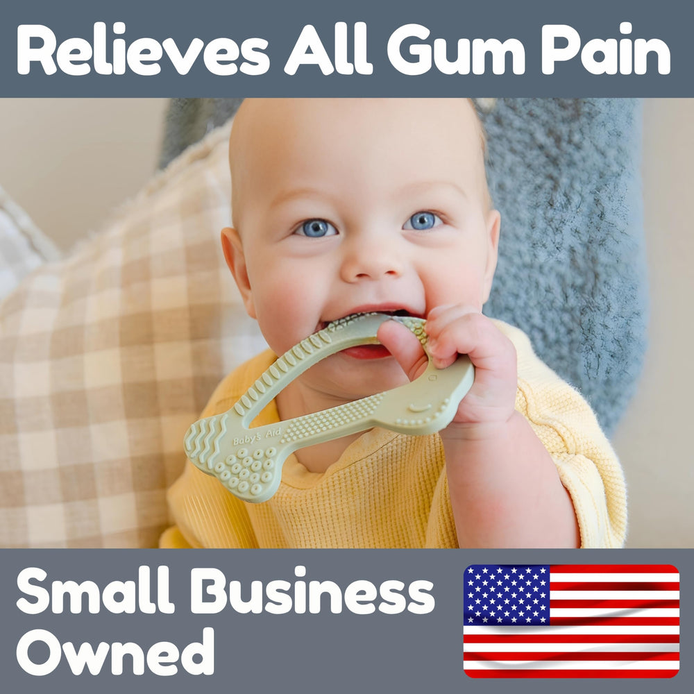 Baby's Aid dolphin teether features multi-textured grooved body and smooth fins.