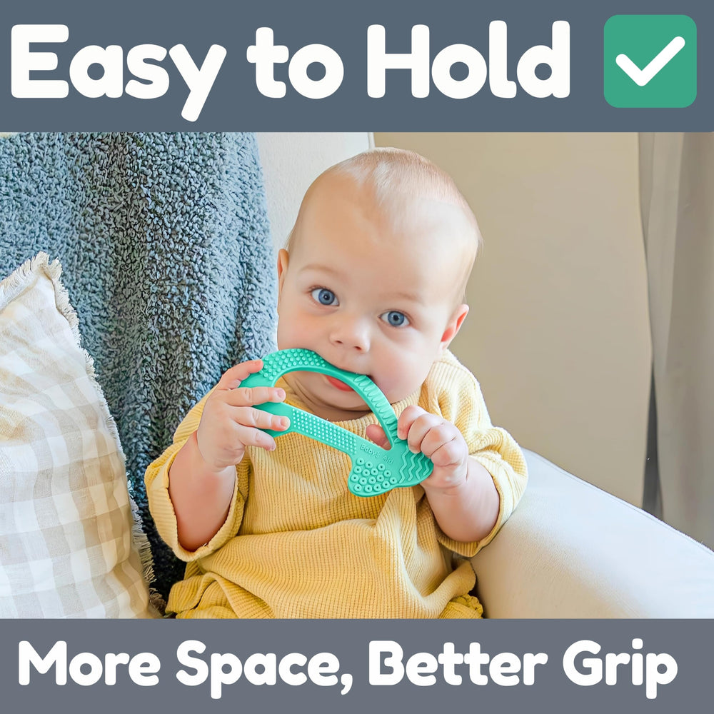 Baby's Aid dolphin teether textures include grooved body and smooth fins for varied chewing.