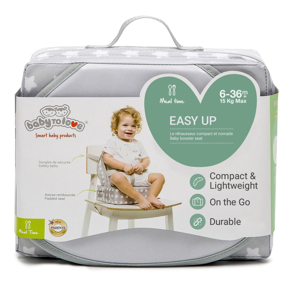 BabyToLove Easy Up booster seat folded with travel handle for easy portability.