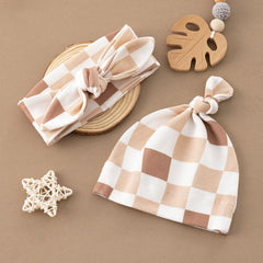 BabyWhale swaddle baby snuggling in blanket demonstrates versatile wrap for restful moments.