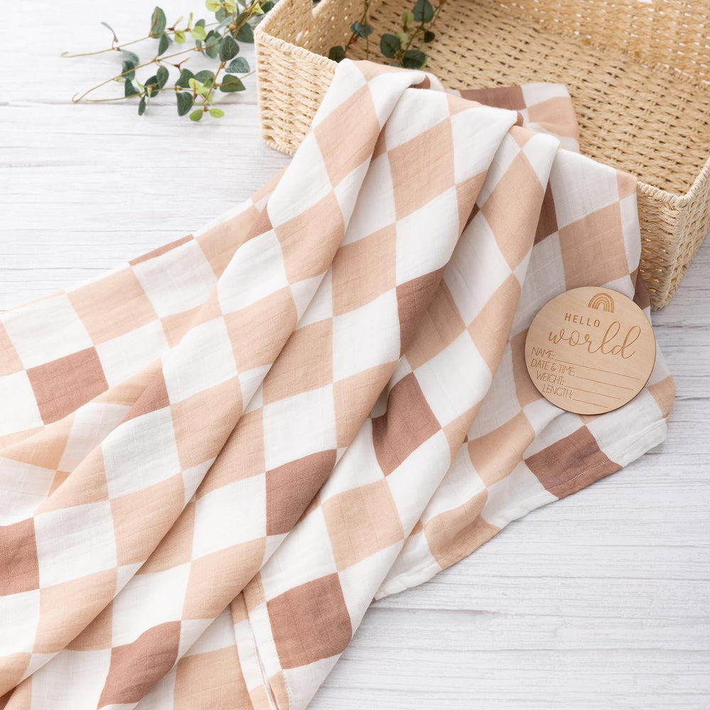 BabyWhale swaddle hand-drawn pattern close-up highlighting stylish design for photoshoots.