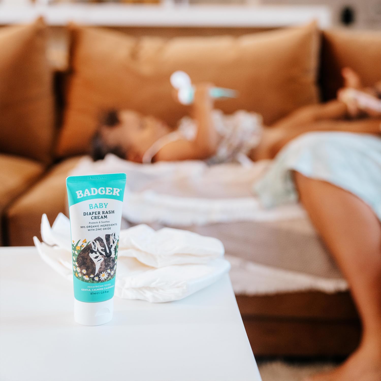 Badger Diaper Cream travel-size bottle for on-the-go diaper care
