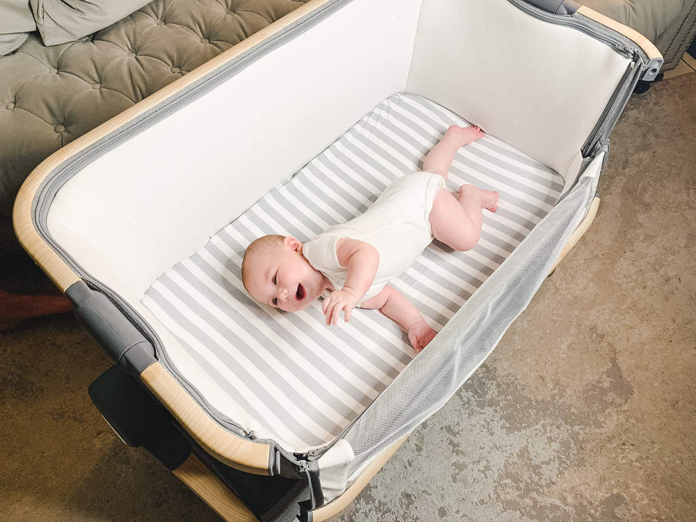 Baebae Goods four-pack bassinet sheets neatly stacked for easy setup