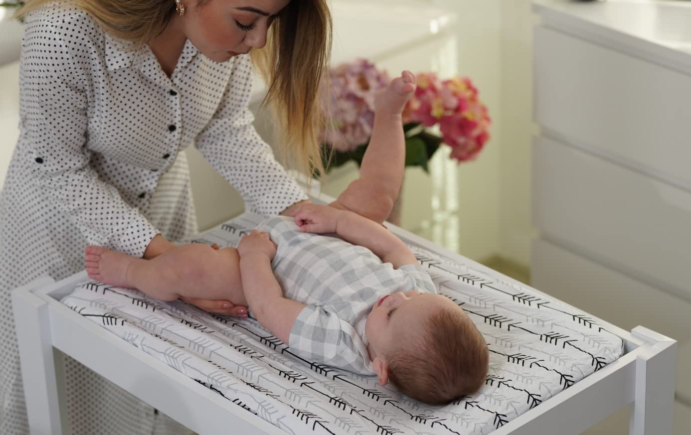 BaeBae Goods changing pad covers blending with neutral nursery decor.