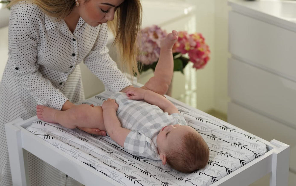 BaeBae Goods changing pad covers blending with neutral nursery decor.