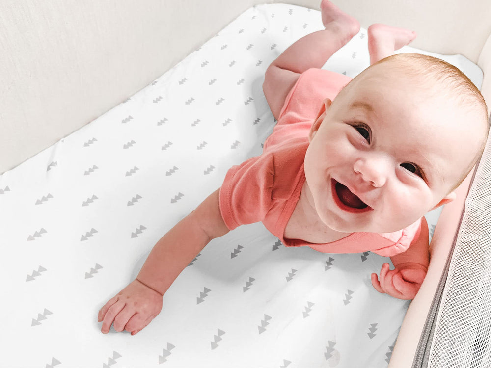 Baebae Goods Chevron pattern bassinet sheet closeup highlights modern nursery style.