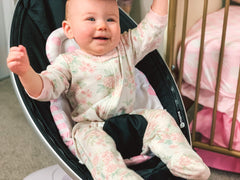 BaeBae Goods infant insert offers reversible plush sides for extended comfort.