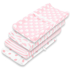 BaeBae Goods pink-white changing pad cover closeup showing secure elastic fit.