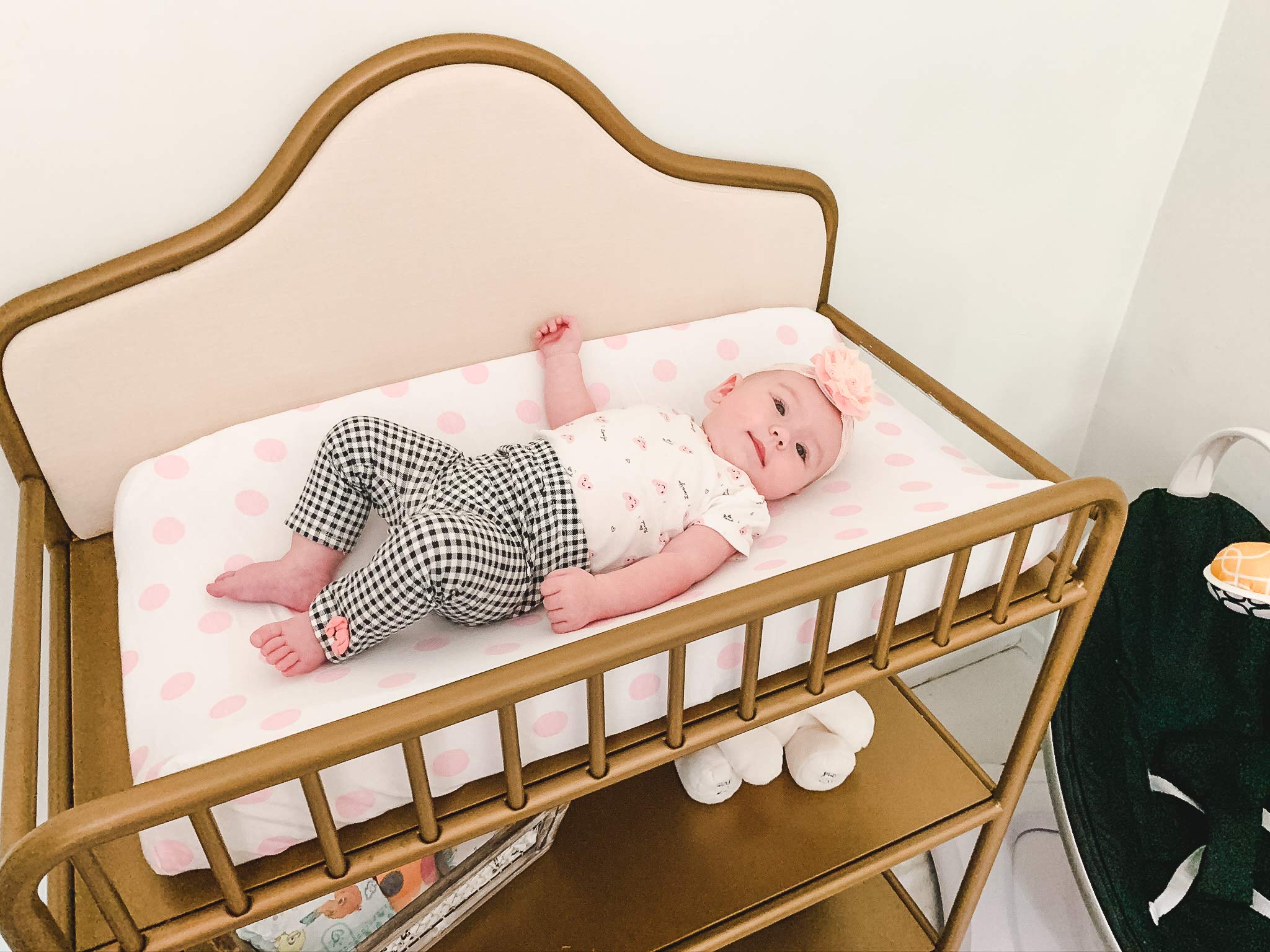BaeBae Goods pink-white design showcases nursery styling and color coordination.