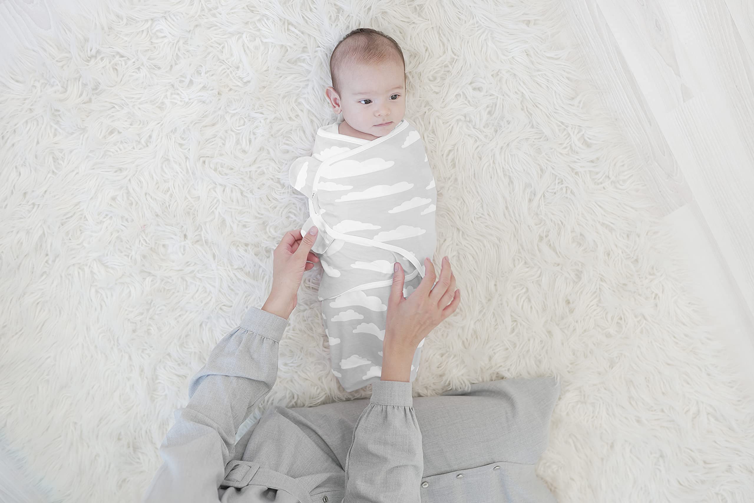BaeBae Goods newborn size swaddle measures 26x21 inches for growing babies