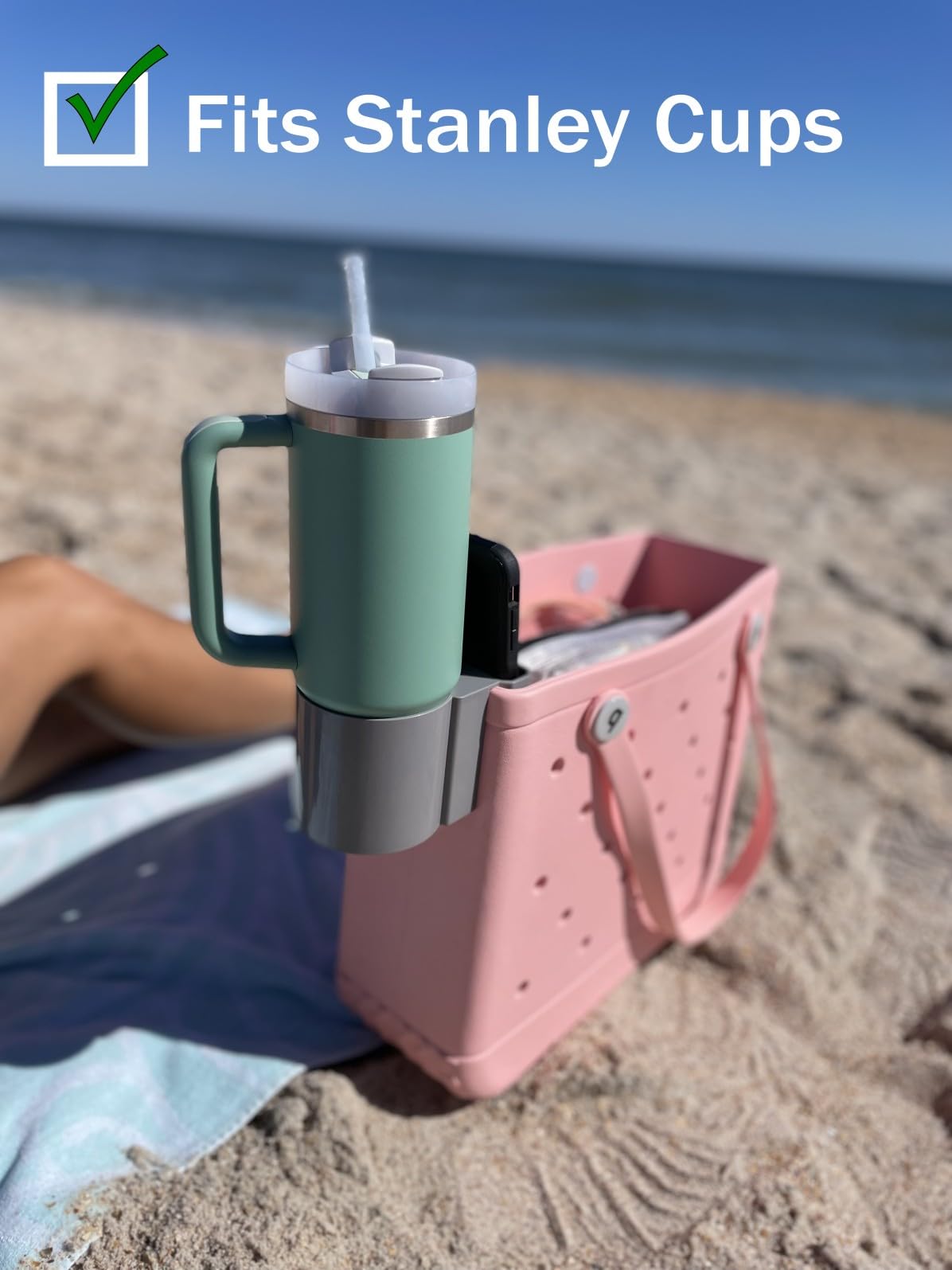 Bag Lady phone holder on Bogg Bag keeps phone accessible while you roam.