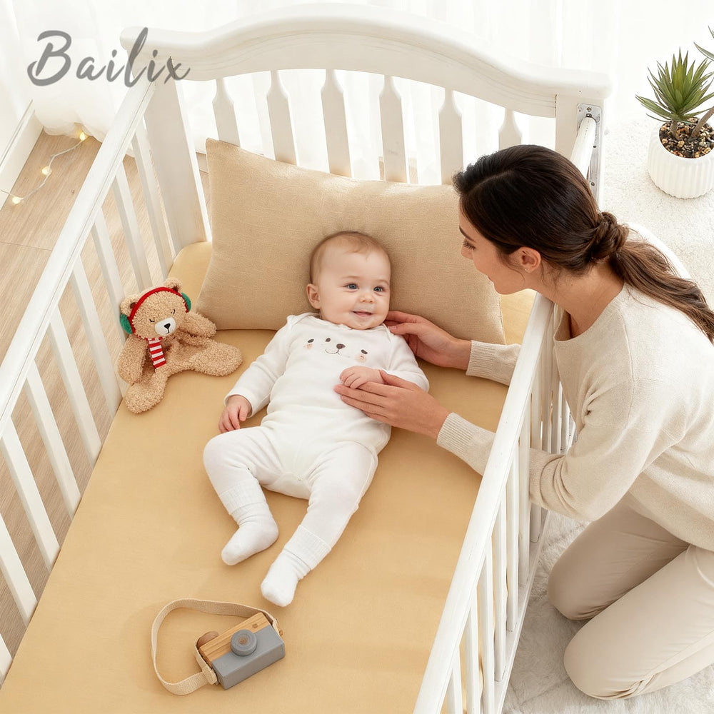 Bailix heavyweight muslin crib sheet snug-fit assembly highlights secure deep-pocket design.