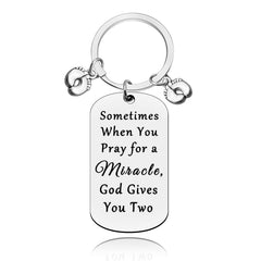Baipilu Twin Mom Keychain close-up in silver showcases durable engraving for twins celebration.