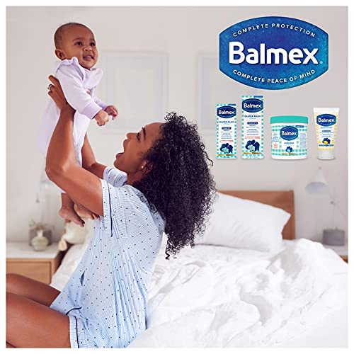Balmex cream being spread on baby skin to demonstrate easy-on-off texture.