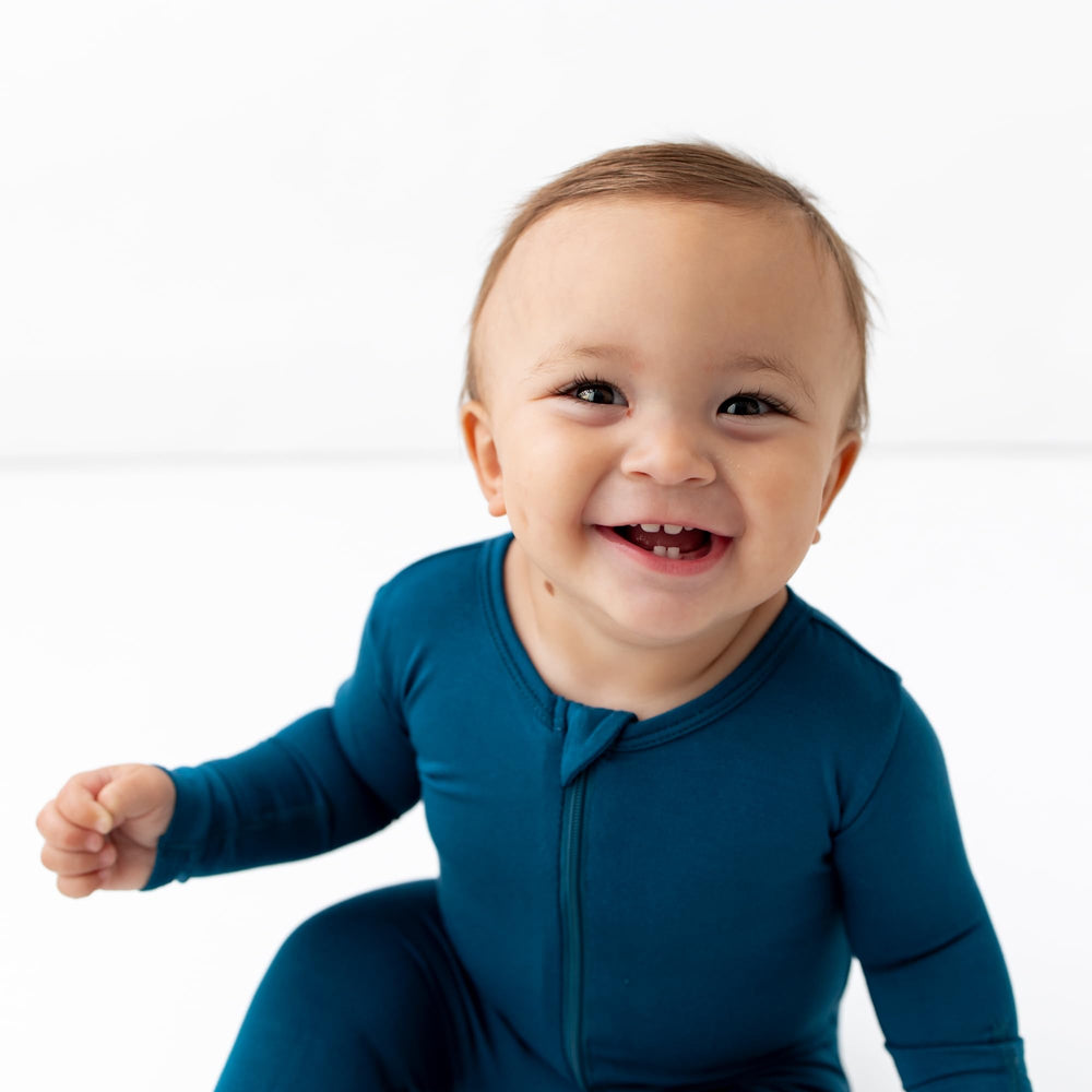 Bamboo Little footie keeps baby comfy during play or rest with breathable balance.