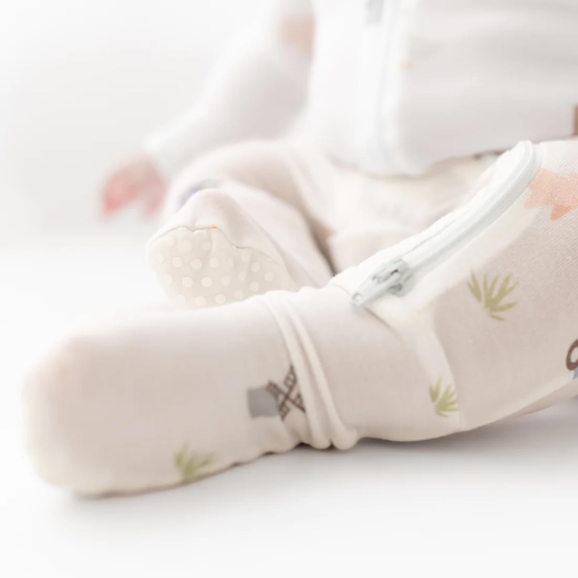 Bamboo Little size 0-3m footie aims for a snug, comfy newborn fit.