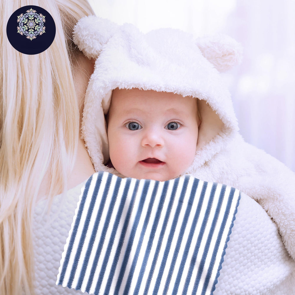 BAMBOO QUEEN burp cloths used as soft changing surface on the go