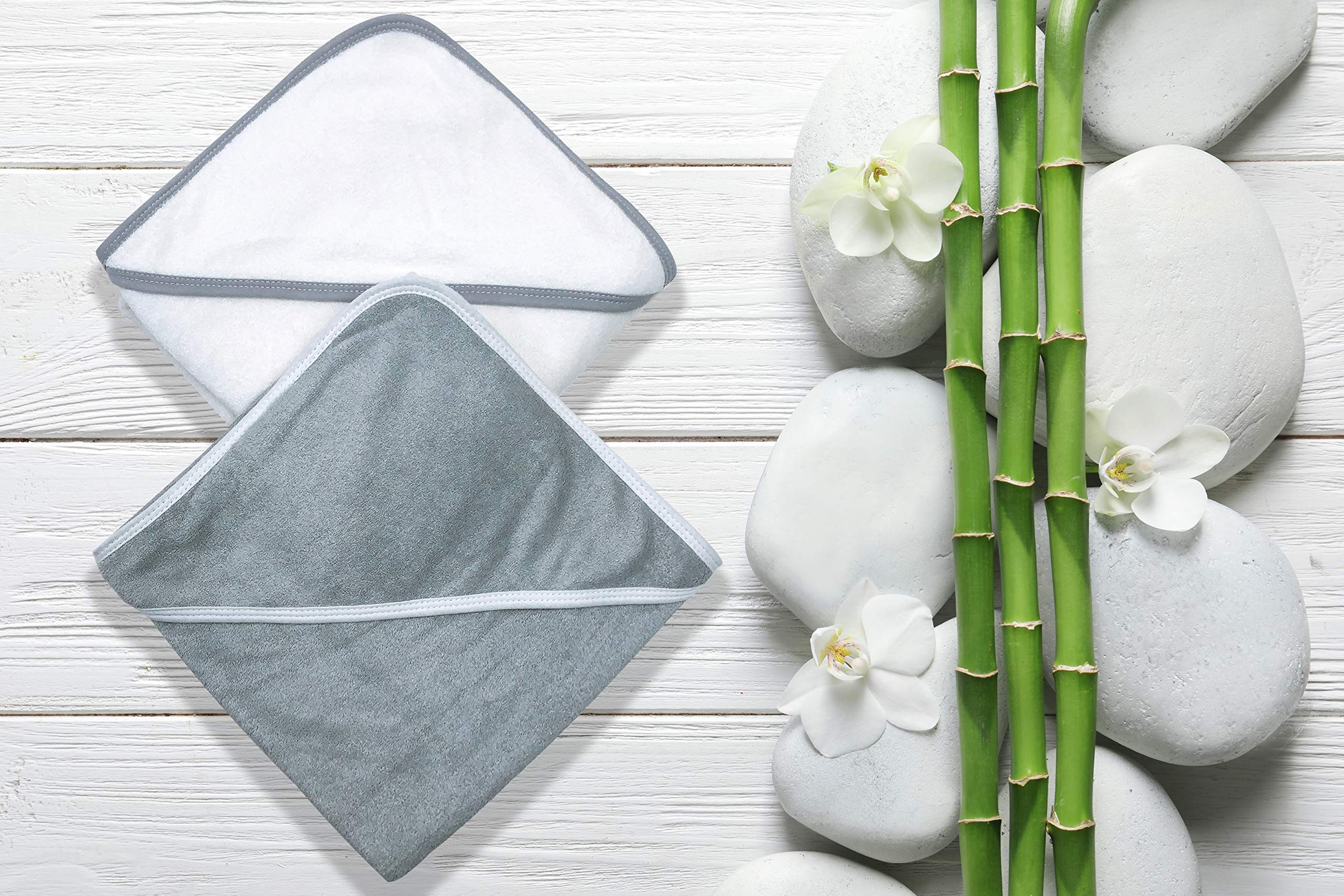 BAMBOO QUEEN hooded towel on baby, thick texture for cozy post-bath wrap.