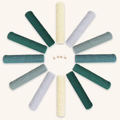 BAMBOO QUEEN slate burp cloths spread highlighting gentle, durable muslin for spill protection.