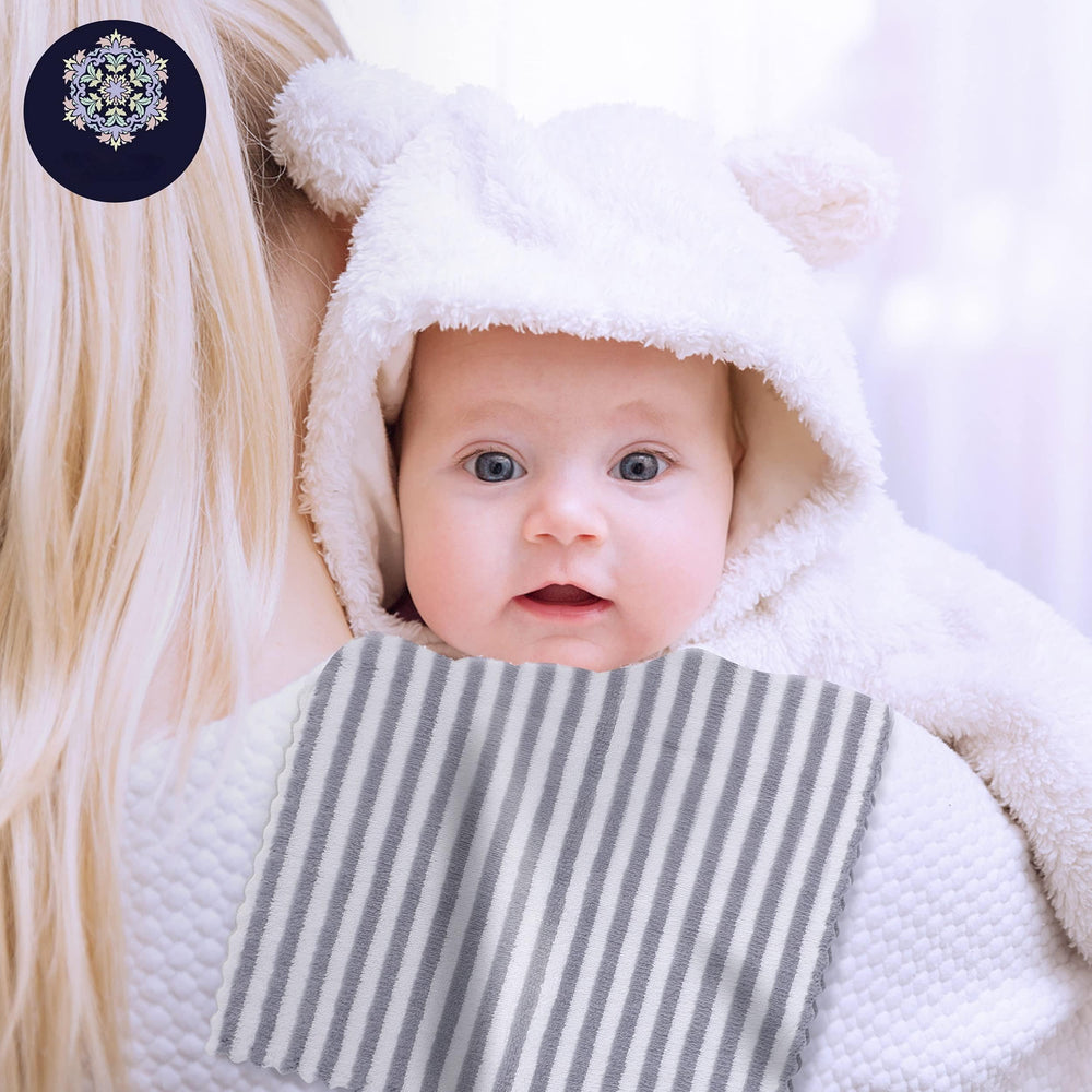 BAMBOO QUEEN coral fleece closeup highlights ultra-soft texture ideal for delicate baby skin.