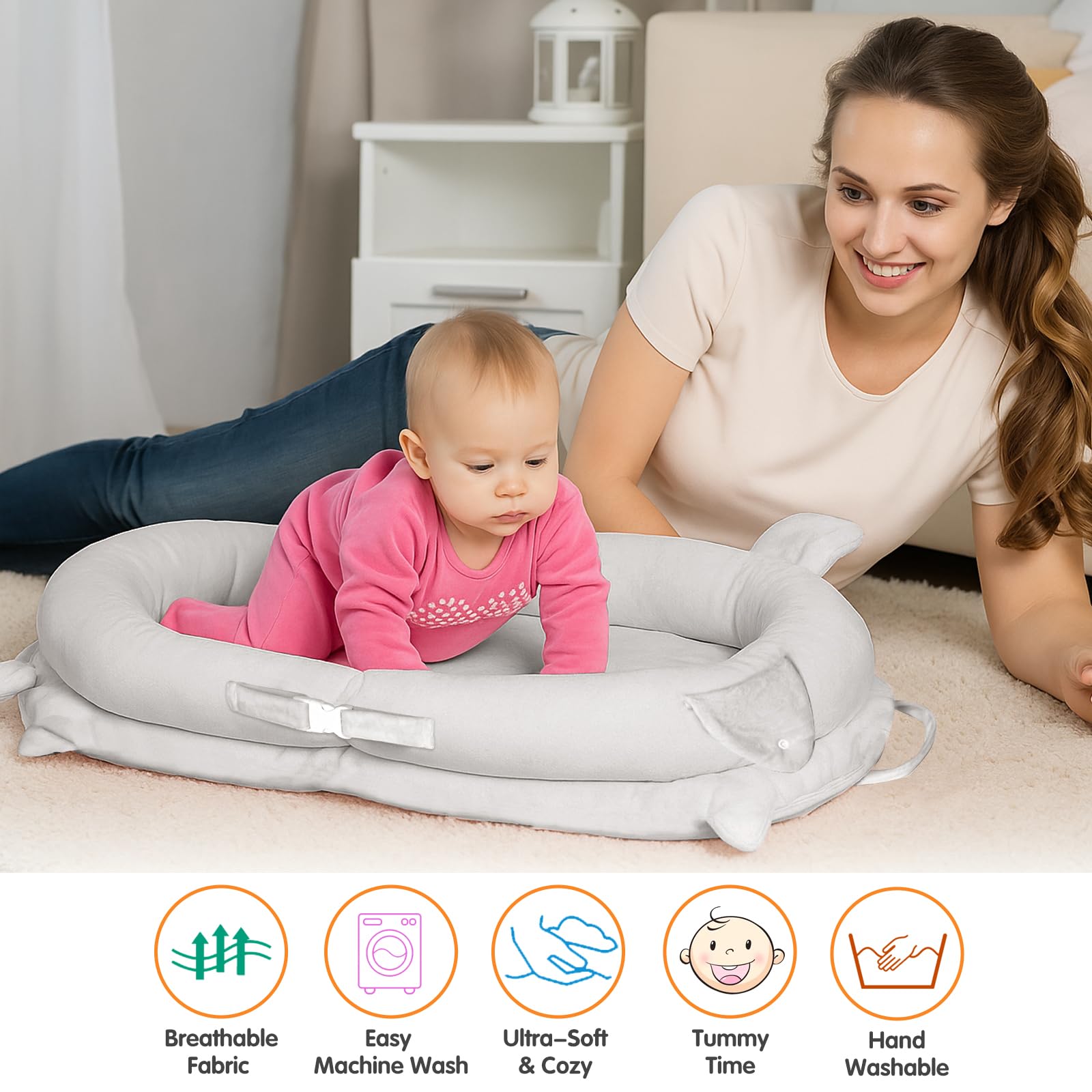 Banakshol baby lounger gray during tummy time to encourage head lift.